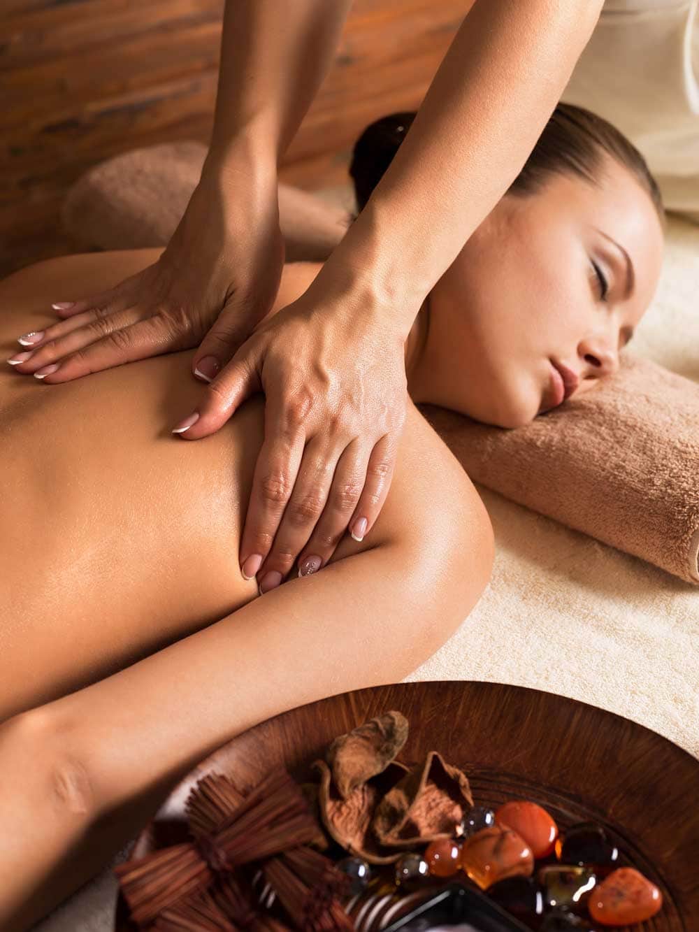 relaxing with back massage at spa salon